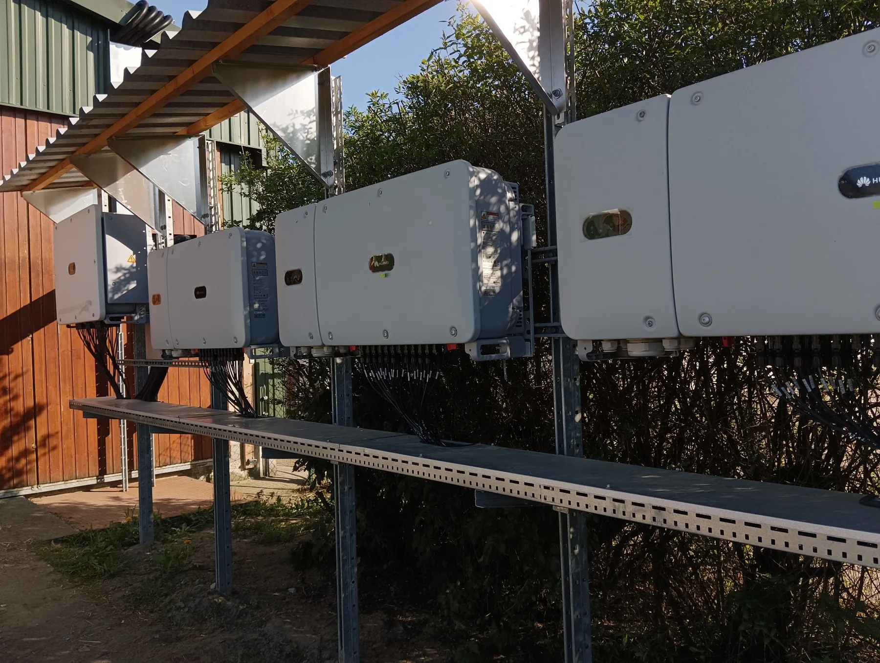 Outdoor photovoltaic inverter bank installed by A-G-BAU